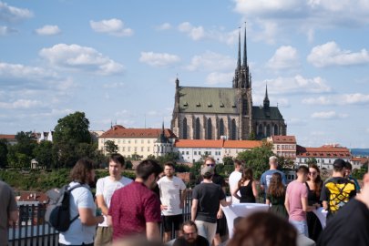 Terrace party with the Brno cathedral in the background.